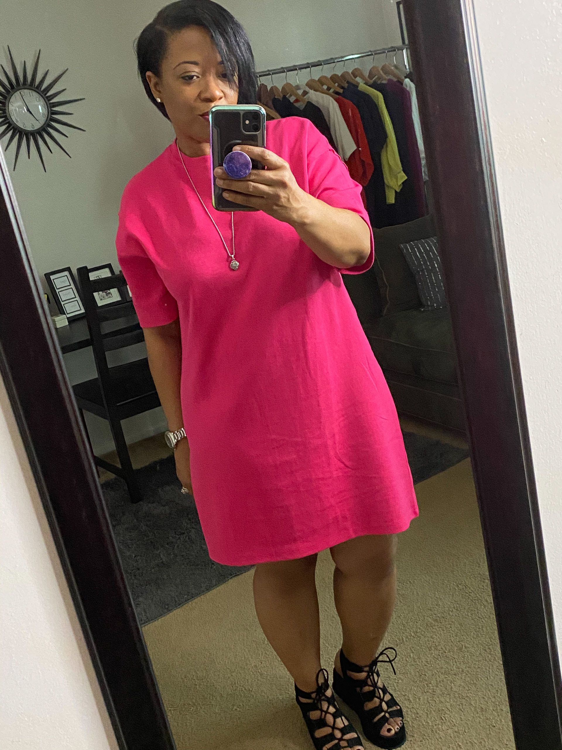 Style and Image Consultant, Robin Fisher wearing a bold colored hot pink T-shirt dress with black sandals.